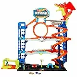 Hot Wheels Let's Race Netflix - Ultimative Garage - Mehrere Ebenen Parkgarage, 3ft hoch, mit 2 Die-Cast-Autos, ab 5 Jahren, Rennspaß, Stunt-Abenteuer, Drachenkampf, Autowaschanlage, Fahrstuhl, HKX48