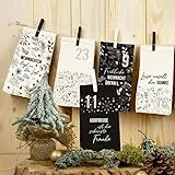 Papierdrachen Adventskalender 2025 zum Befüllen - Motiv Holy Night - 24 schwarze & weiße Papiertüten mit Zahlenaufklebern und Klammern - DIY Weihnachten