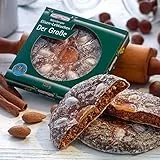 Der Große Lebkuchen 375g (1 Packung) Fein glasiert und mit Mandeln und Orangeat dekoriert, ist er mit 13 cm Ø unser größter Elisen-Lebkuchen. Original Haeberlein-Metzger.