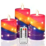 LED-Kerze mit Lichterkette und Fernbedienung - Tanzende Flamme und Regenbogenverlauf